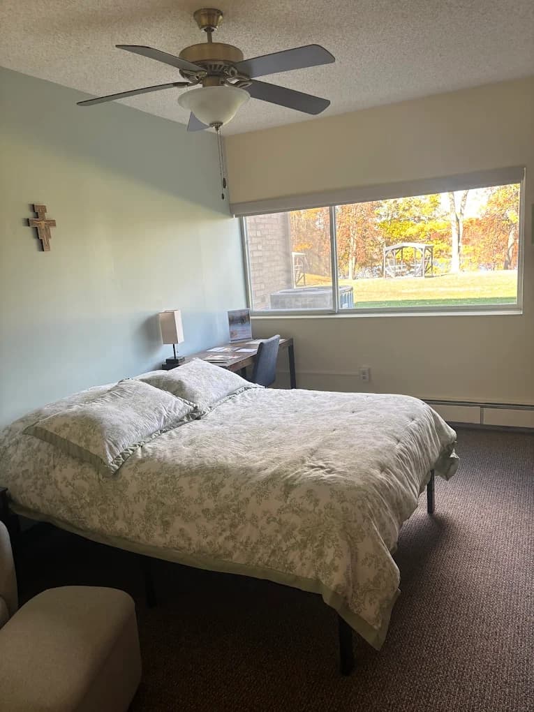 Comfortable guest room at Maryville Retreat Center